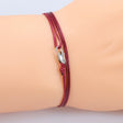 Boho Style Perlenarmband mit Muschel-Anhänger.